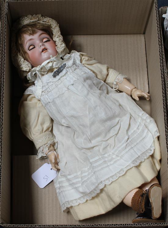 A Simon & Halbig Kammer & Reinhardt doll, original clothes, body in good condition, pale oily bisque, pierced ears, 20in.